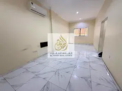One-bedroom apartment with a living room and 2 bathrooms; spacious unit located in Al Muwaihat 1.
