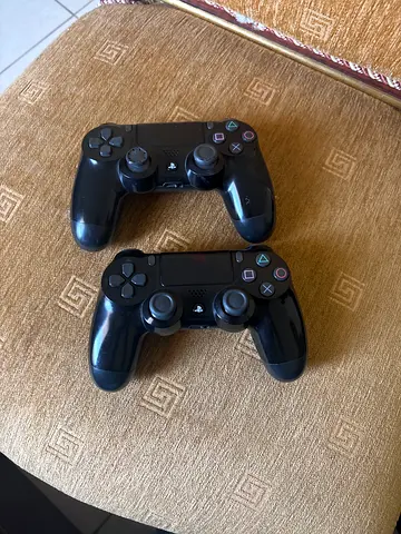 Pair of Sony DualShock 4 Wireless Controllers - Good Working Condition