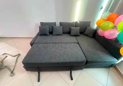 IKEA L shap Sofa store cum bed you can fix the storage lift