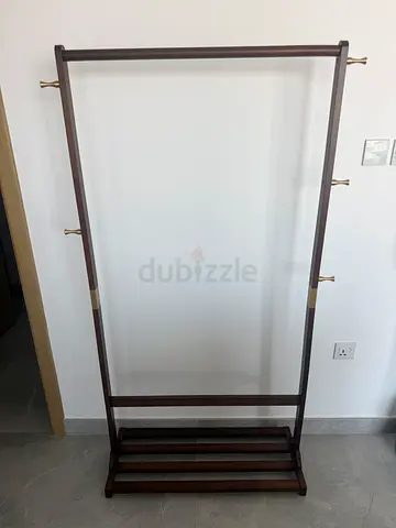 Solid wood clothing rack with brass hooks - mint condition