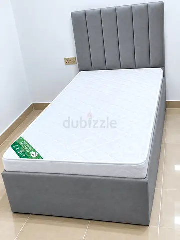 Single grey upholstered bed frame with mattress - good condition