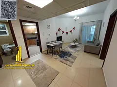 🏡 A luxurious one-bedroom apartment (with a living room) in Al Nuaimiya 3, Sheikh Khalifa Street,