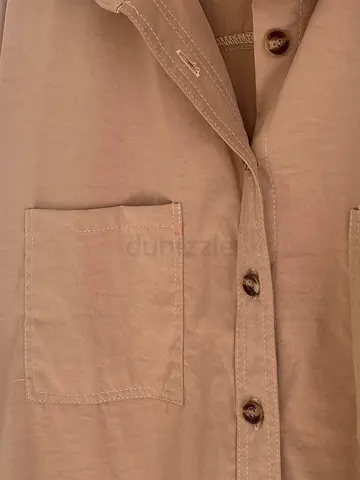 Beige button-up shirt