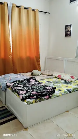 FULLY FURNISHED SHARING FAMILY ROOM AVAILABLE IN NEW MUWEILAH