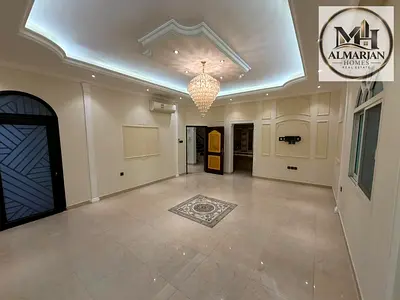 Experience the largest villa in Al Muwaihat, located directly at the exit toward Dubai. It features five master bedrooms, a private courtyard, and ded
