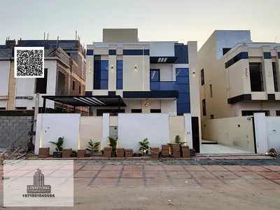 Villa for sale in Ajman, Al Helio area. 5 master bedrooms, majlis, living room, and maid's room. Ba