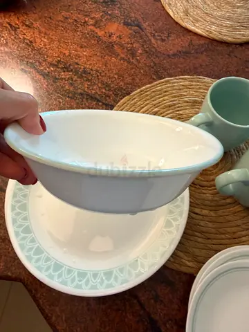 Set of ceramic dinner bowls and plates - light green trim, gently used 16 pieces