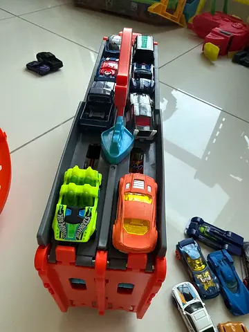 Hot Wheels car carrier playset with multiple toy cars