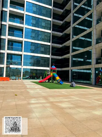 Two rooms and a hall for sale, very spacious area, Gulf Tower, Ajman, with three bathrooms, a separate spacious kitchen, a large balcony with a very w