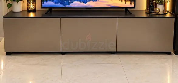 Modern low-profile TV cabinet / entertainment unit in beige