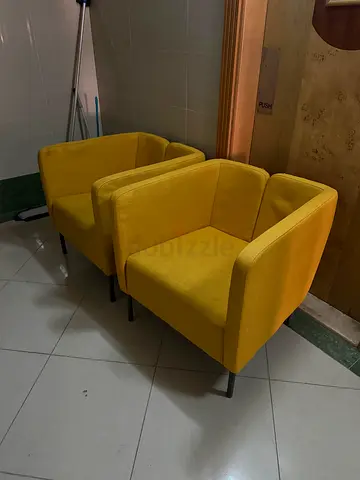 Pair of mustard yellow modern lounge chairs — good condition
