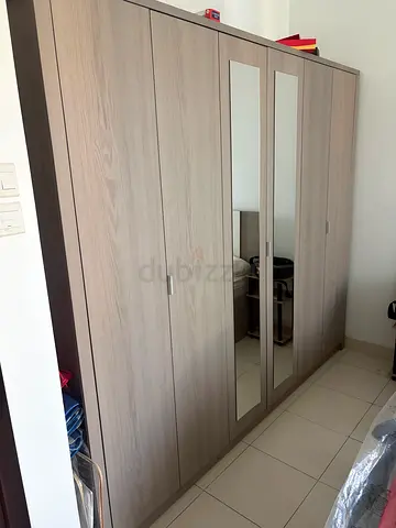 Light wood wardrobe / cupboard with multiple shelves – good condition