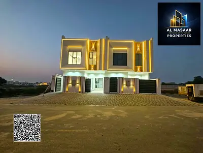 Villa for sale in Al Helio 1, Ajman; features 4 master bedrooms and a roof terrace—price includes a