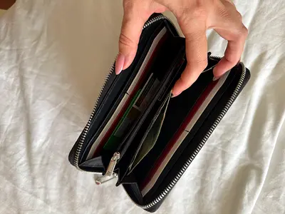 Tommy Hilfiger Black zip-around leather wallet — good condition