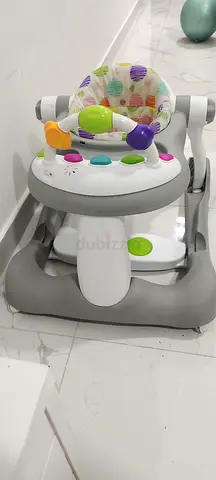 Baby walker with activity tray and cushioned seat - good condition