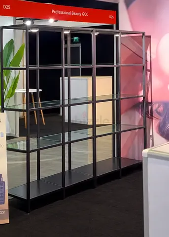 Two Black Metal Display Units with Glass Shelves