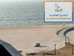 2 bedrooms, living room, 2 bathrooms, and a balcony with a sea view; central air conditioning. Locat