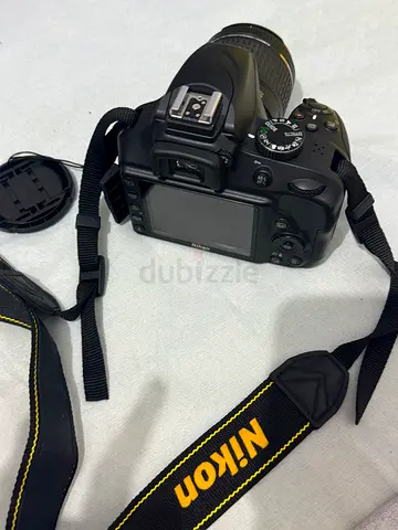 Used Nikon DSLR with kit zoom lens - good working condition