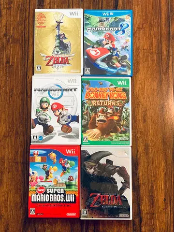 Nintendo Wii game collection — Zelda, Mario Kart, Donkey Kong, New Super Mario Bros