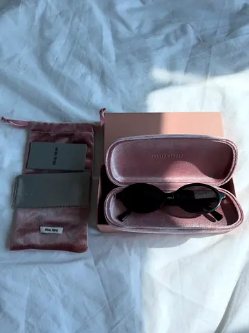 Miu Miu oval sunglasses, authentic (have a check)