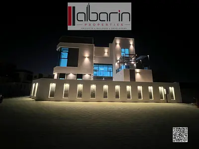 Luxury corner villa for sale in Al Helio 2, Ajman. Features 6 master bedrooms, a swimming pool, and an elevator. 4,977 sq. ft. Fees included.