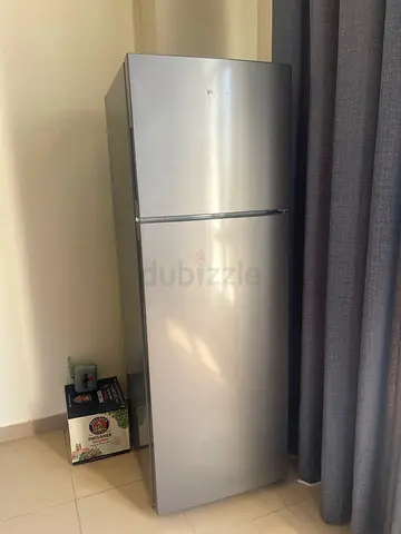 Silver two-door refrigerator (top freezer) - good condition