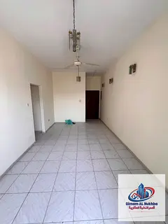 2BR in Al Butina, AED 28K, 2 balconies, family-only, ground parking, 4/6 payments, 1 month free, nea
