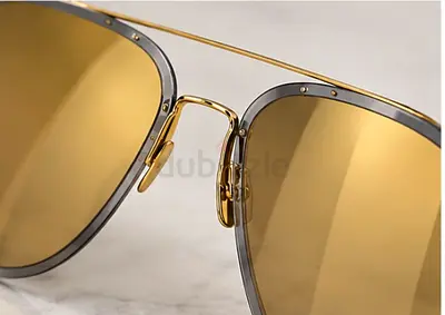 Gold-frame DIOR aviator sunglasses with brown/amber lenses, lightly used