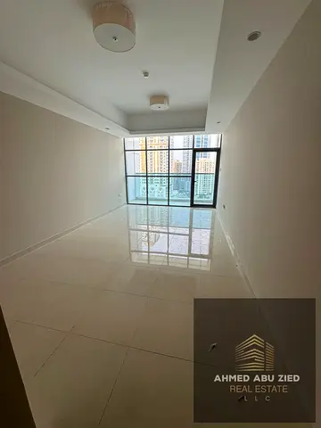 Spacious 1-bedroom apartment in Gulfa Towers, Al Rashidiya 1, Ajman. Beautiful views, panoramic windows, gym, pool, parking, and nearby services.
