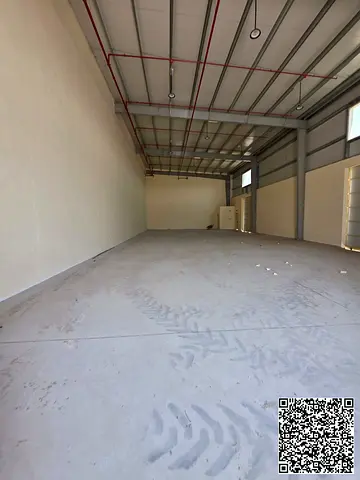 A warehouse with a prime location in Al-Sajaa