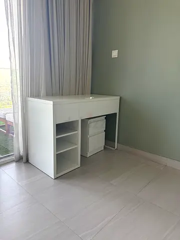 White modern study desk with storage drawers and shelves