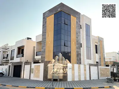 A two-story villa with a rooftop is for sale on Sheikh Mohammed Bin Zayed Road, with all registration and ownership fees included.