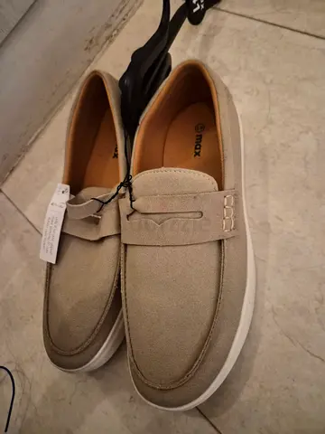 Light beige suede slip-on loafers - size not specified, new