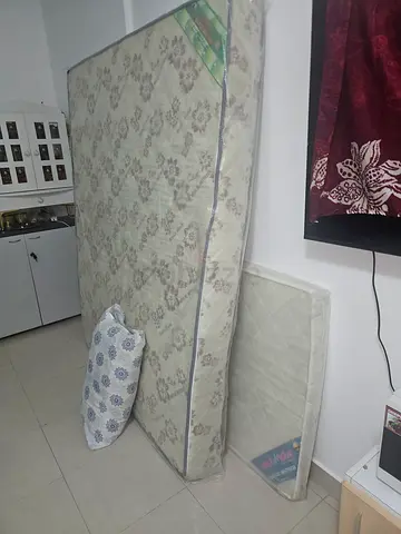 Queen size mattress in good condition — used, clean