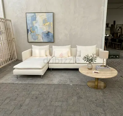 Contemporary White Sofa
Add a fresh and modern touch to your home with this elegant corner sofa. C