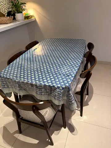 Wooden dining table with 5 upholstered chairs (2 chairs good condition rest need maintenance/repair)