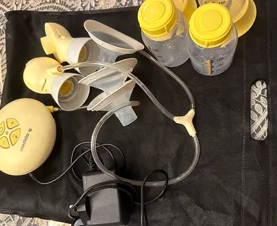 Medela swing flex electric breast pump with bottle