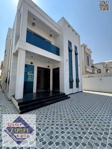 Luxury 5-Bedroom Villa for Sale in Al Mowaihat, Ajman | Elevator, Rooftop & Stone Facade