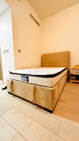 Single bed frame with headboard and mattress — good condition