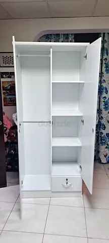 White Tall Wardrobe/Storage Cabinet with Shelves and Drawer