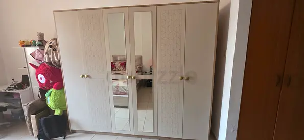 Beige 6-Door Wardrobe with Mirrored Panels — Good Condition