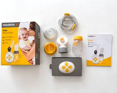Medela Solo Electric Breast Pump with Accessories - Good Condition