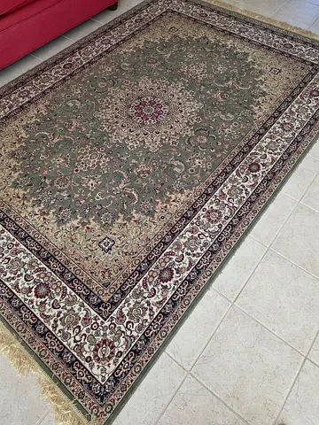 Used traditional Persian-style rug in good condition - medium size