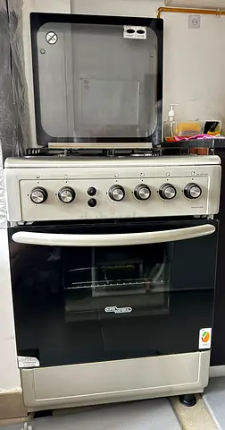 Gas stove with oven griller with 4 burner.