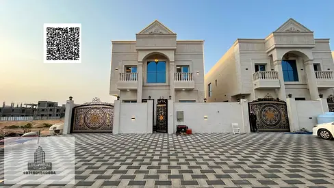 Villa for sale in Ajman, Al Helio area. 5 master bedrooms, majlis, living room, and maid's room. Bank financing available.