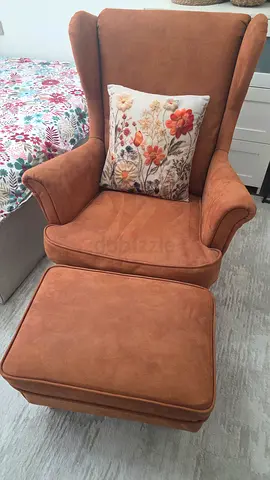 Armchair with ottoman