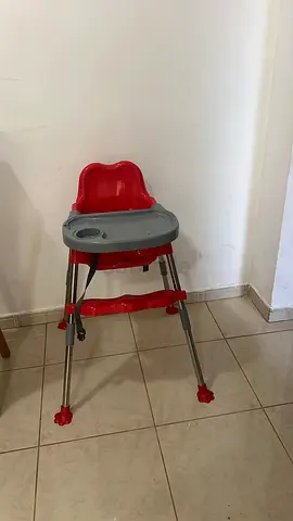 Red baby high chair with removable tray — good condition