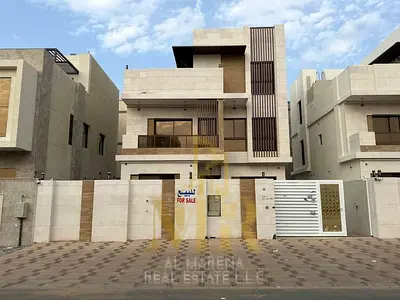 Villa for sale in Al Bahya – Ajman | 5 bedrooms | Two floors plus a roof | Priced at AED 1,800,000, including registration and ownership transfer f
