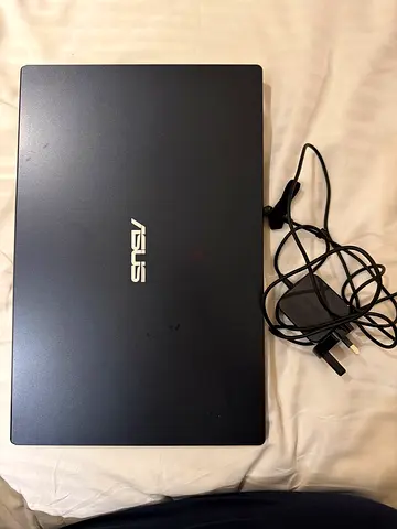 ASUS laptop with charger - good working condition