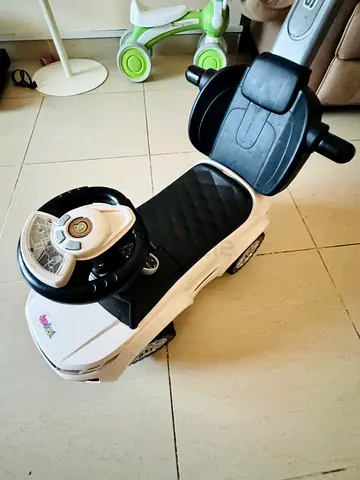 White Push Ride-On Car with Handle and Steering Wheel - Good Condition